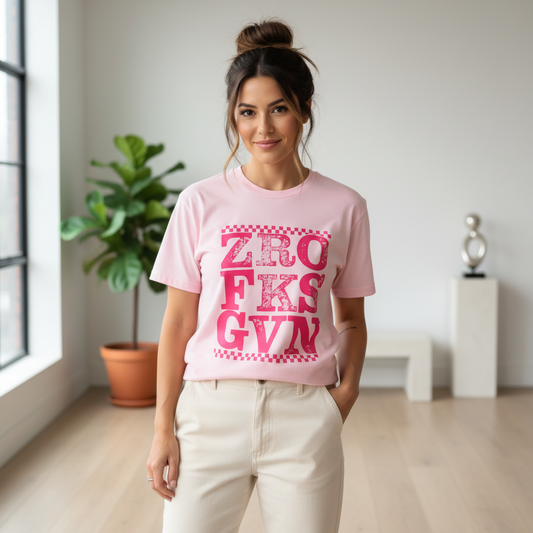 Woman with messy bun wearing Zero F*cks Given t-shirt